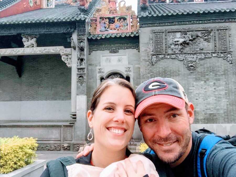 Couple adopting a son from China go sightseeing while waiting to finalize the adoption