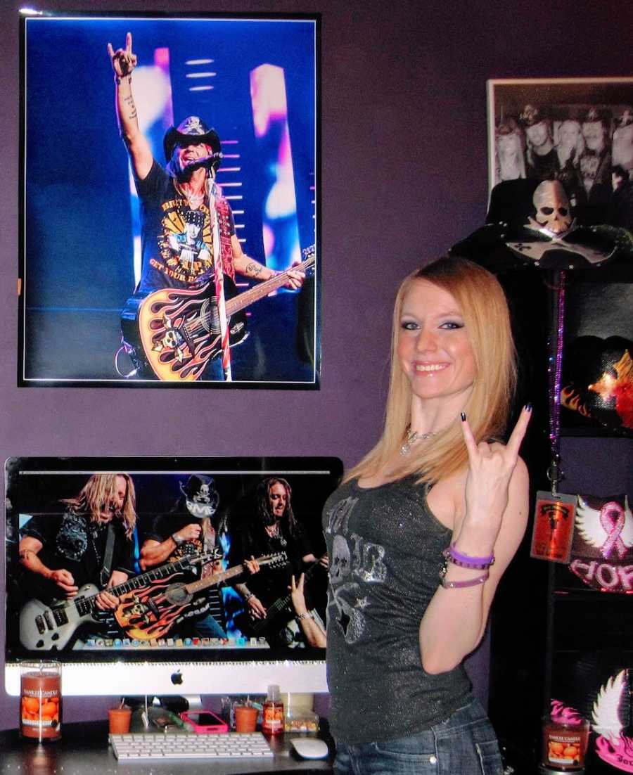 Woman who made hats for Bret Michaels takes photo with her Bret Michaels shrine in her work office