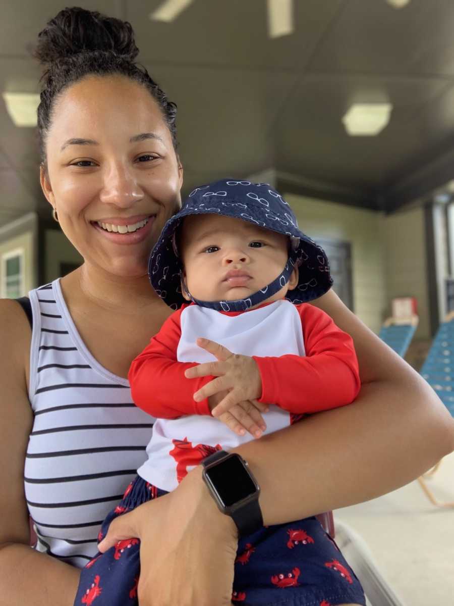 woman holding her baby