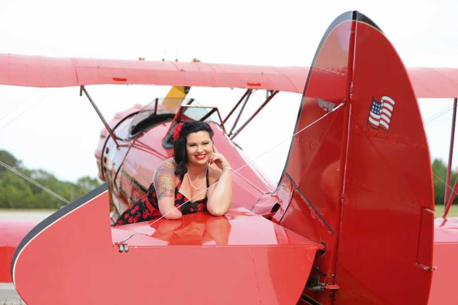 woman in a red airplane