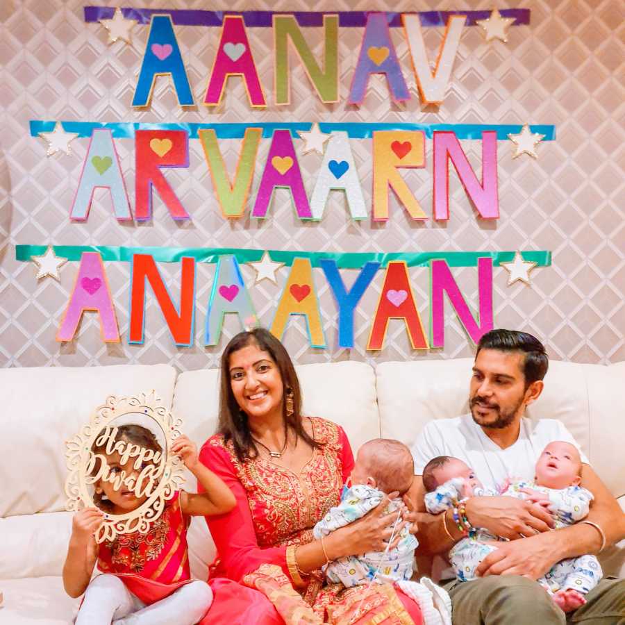 Indian couple celebrate Diwali with their 3-year-old daughter and newborn triplet sons 