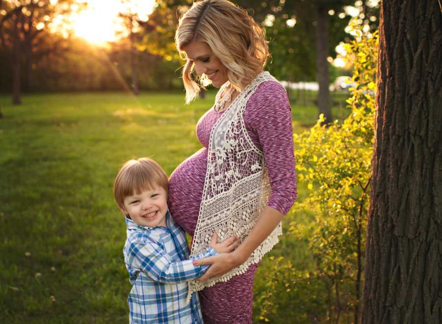 A pregnant mother and her young son