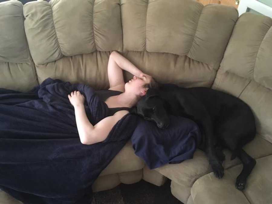 woman on the couch with her dog