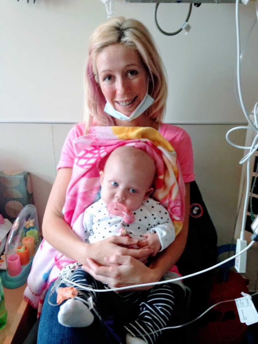 New mom holds her daughter born with no immune system while she's living in the hospital