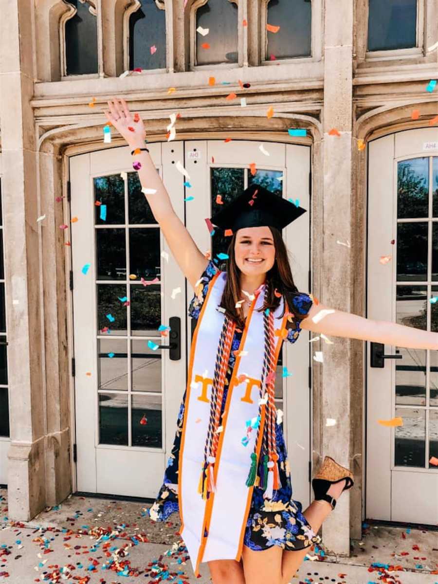 girl in graduation cap with confetti