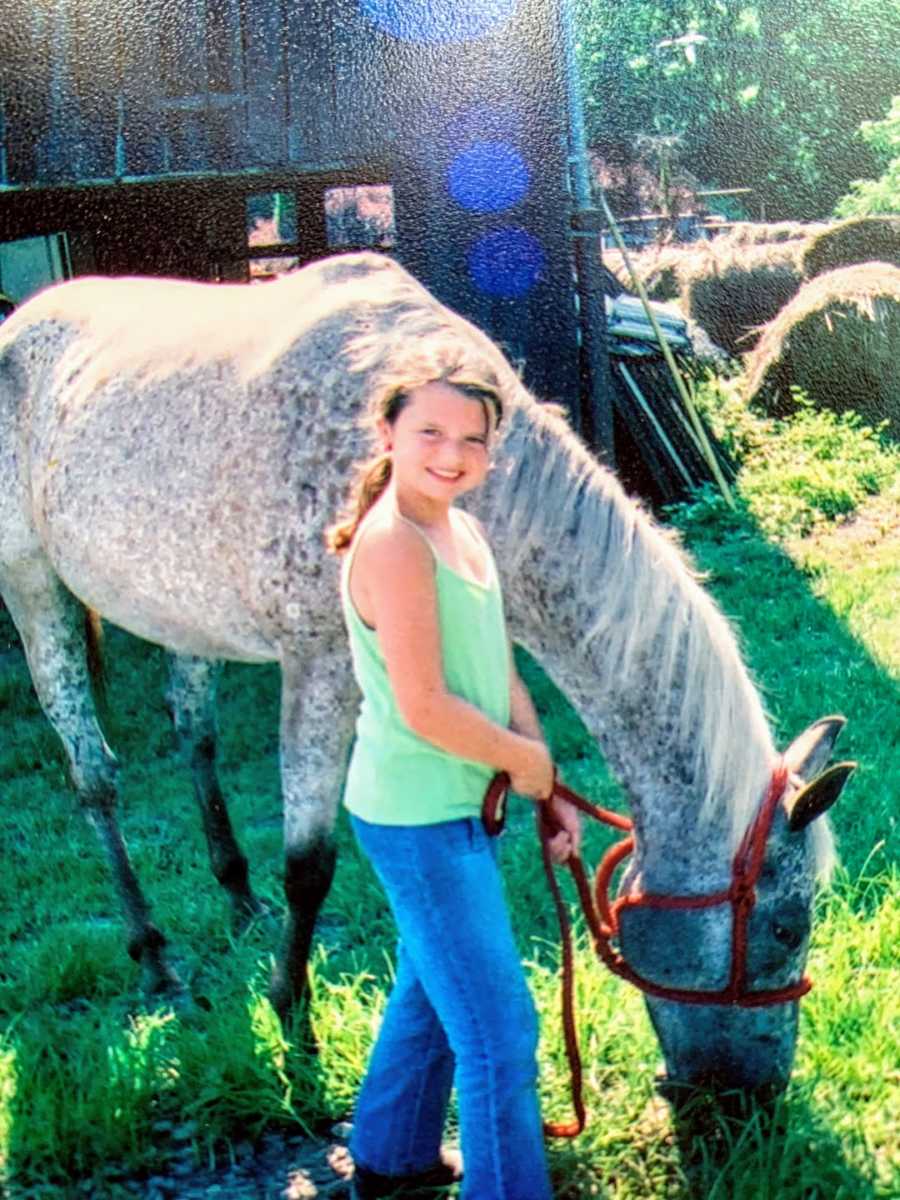 young girl with a horse