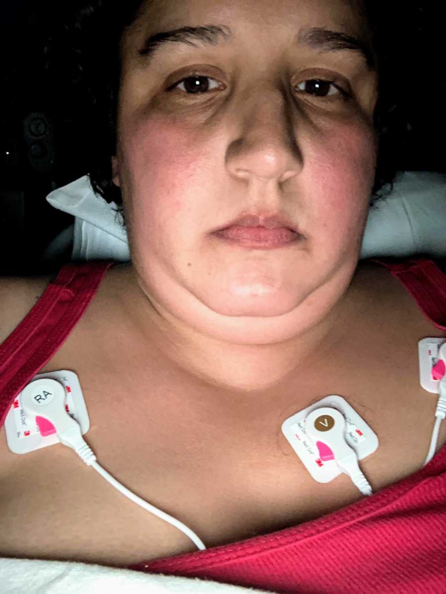 Woman takes selfie in a hospital bed after contracting COVID-19