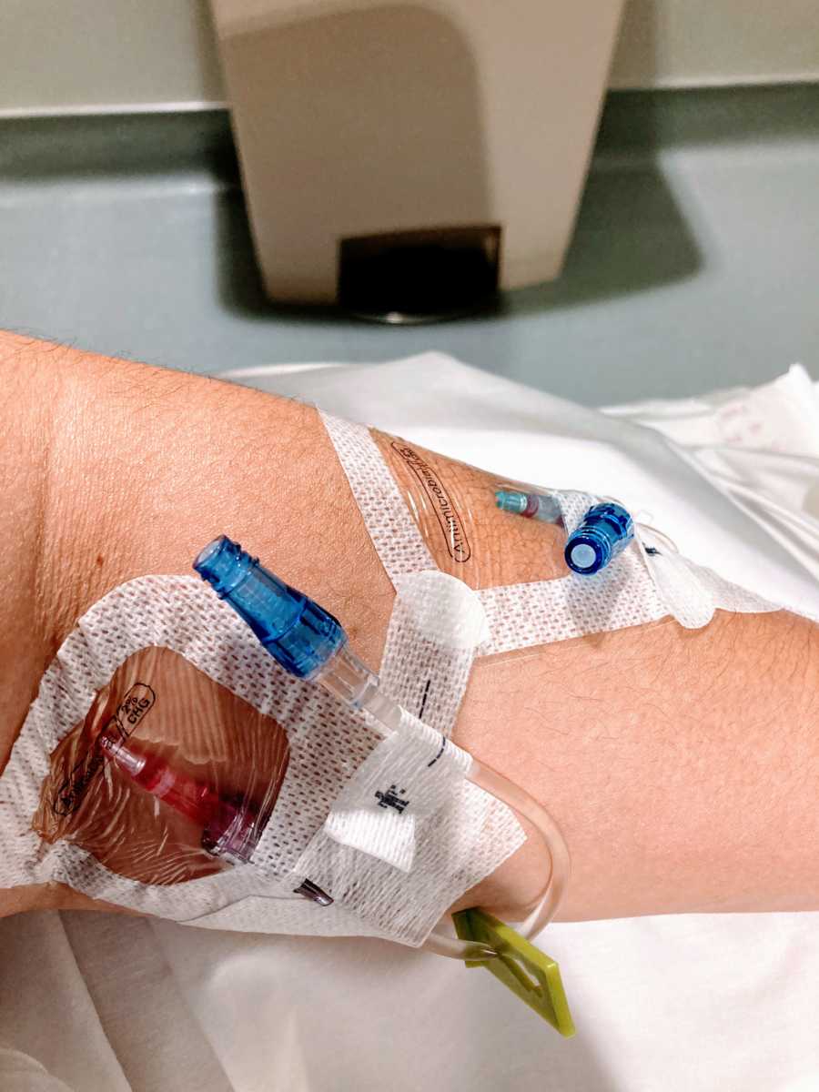 Woman that contracted COVID-19 during July 4th surge takes photo of her two IVs