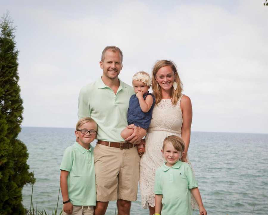 family of 5 outside in matching outfits