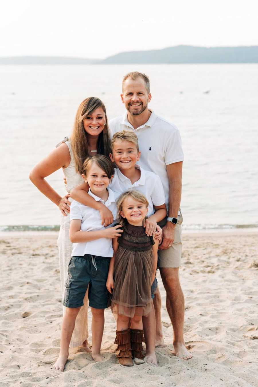 family of 5 on the beach