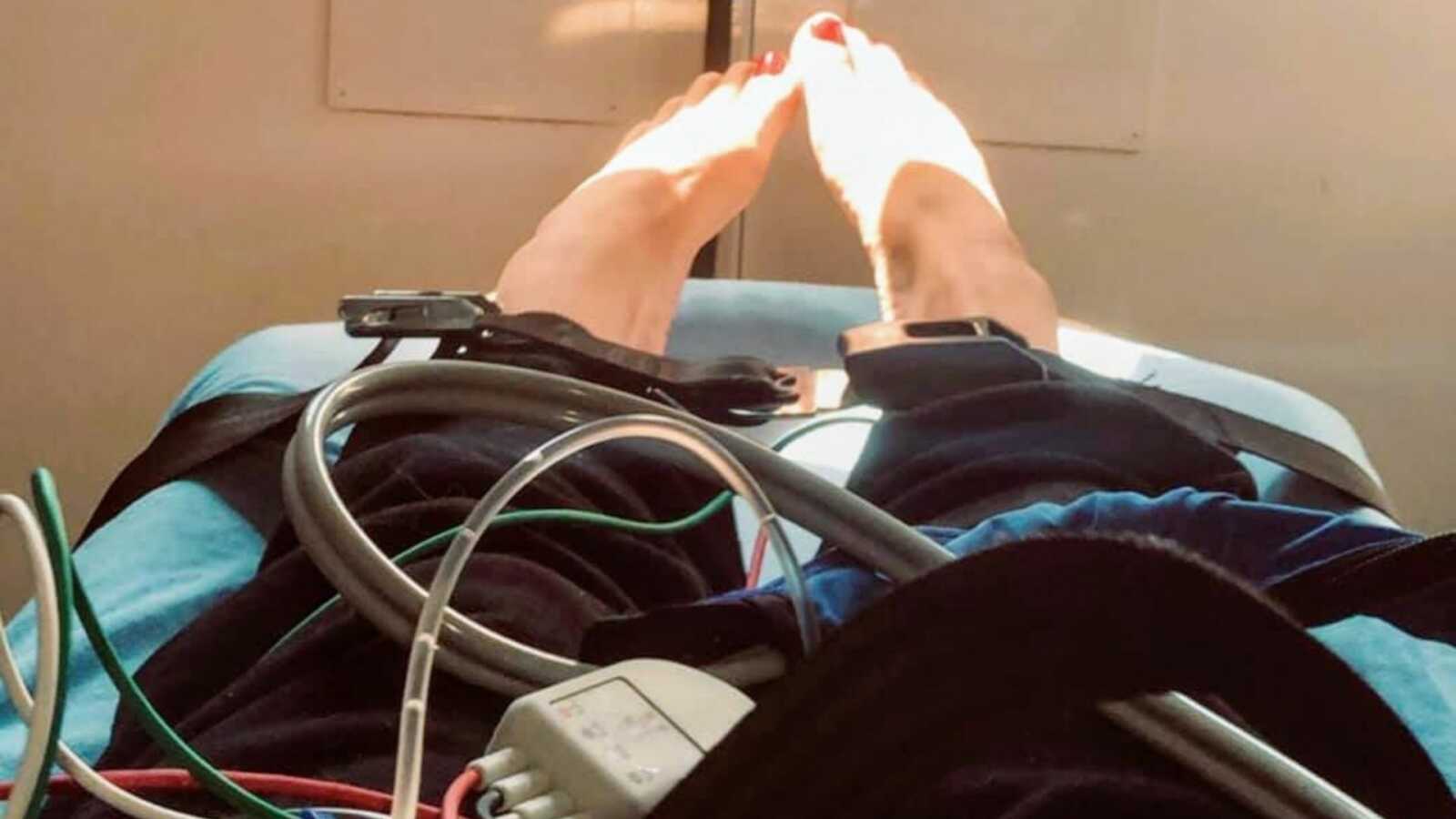 Woman suffering from anxiety takes a photo in the back of an ambulance after a bad panic attack