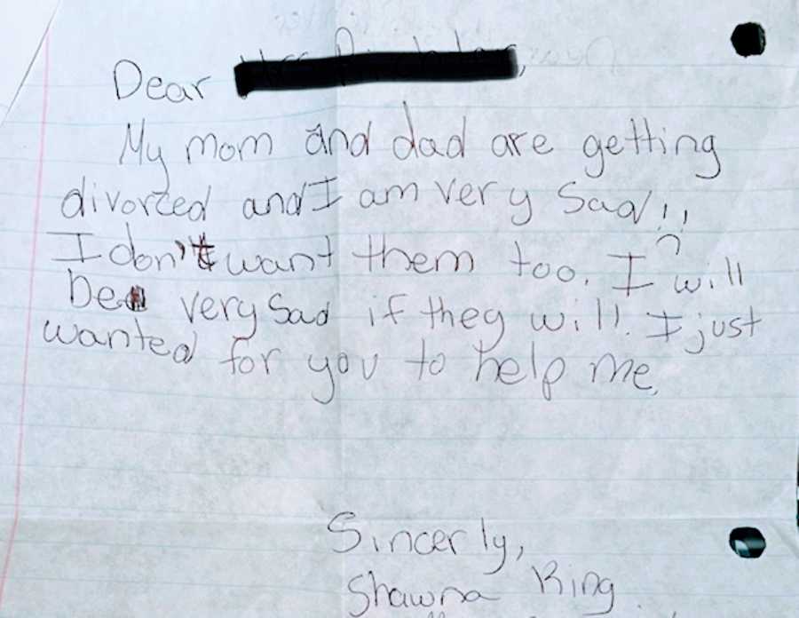 Little girl writes a letter to her teacher asking for help with her parent's divorce