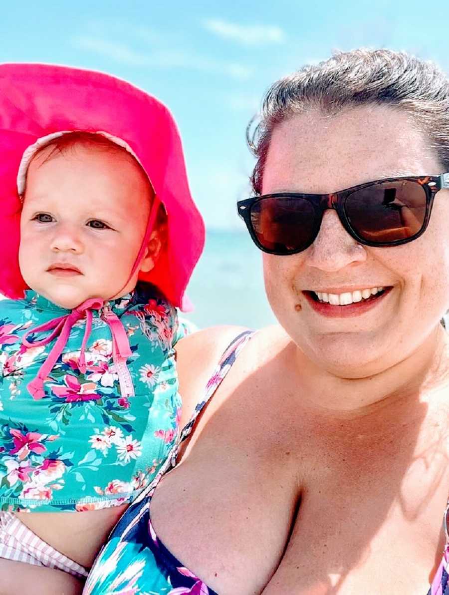 A woman and her daughter at the beach