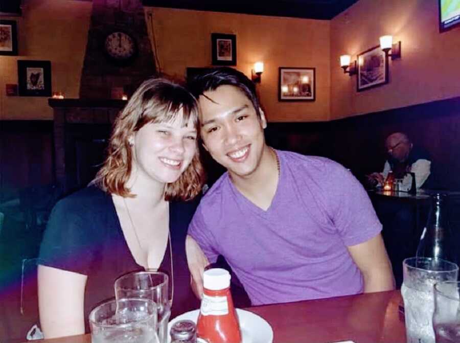 Woman and her boyfriend at a restaurant