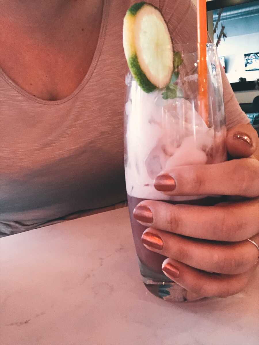 mom at bar having a drink