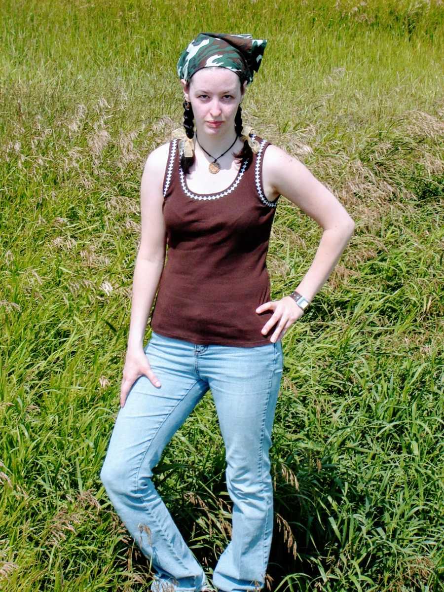 Teenager wearing tank top and camouflage bandana