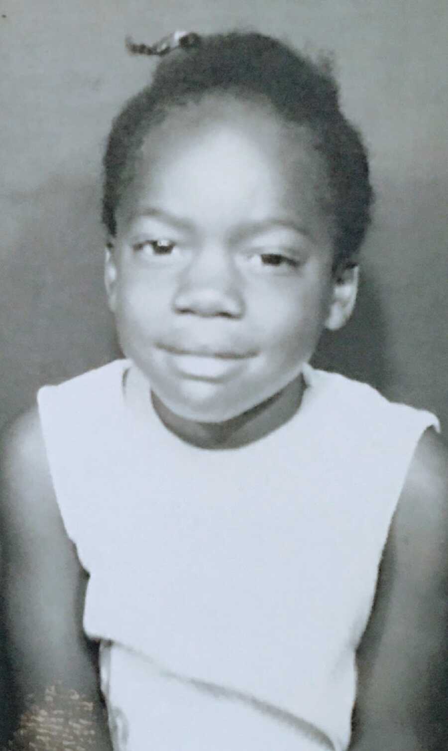 Young girl wearing white dress