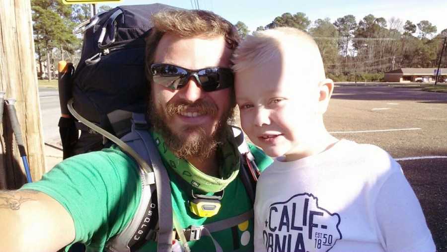 homeless man and cancer survivor child smiling