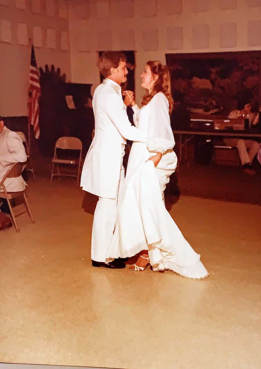 A husband and wife dancing