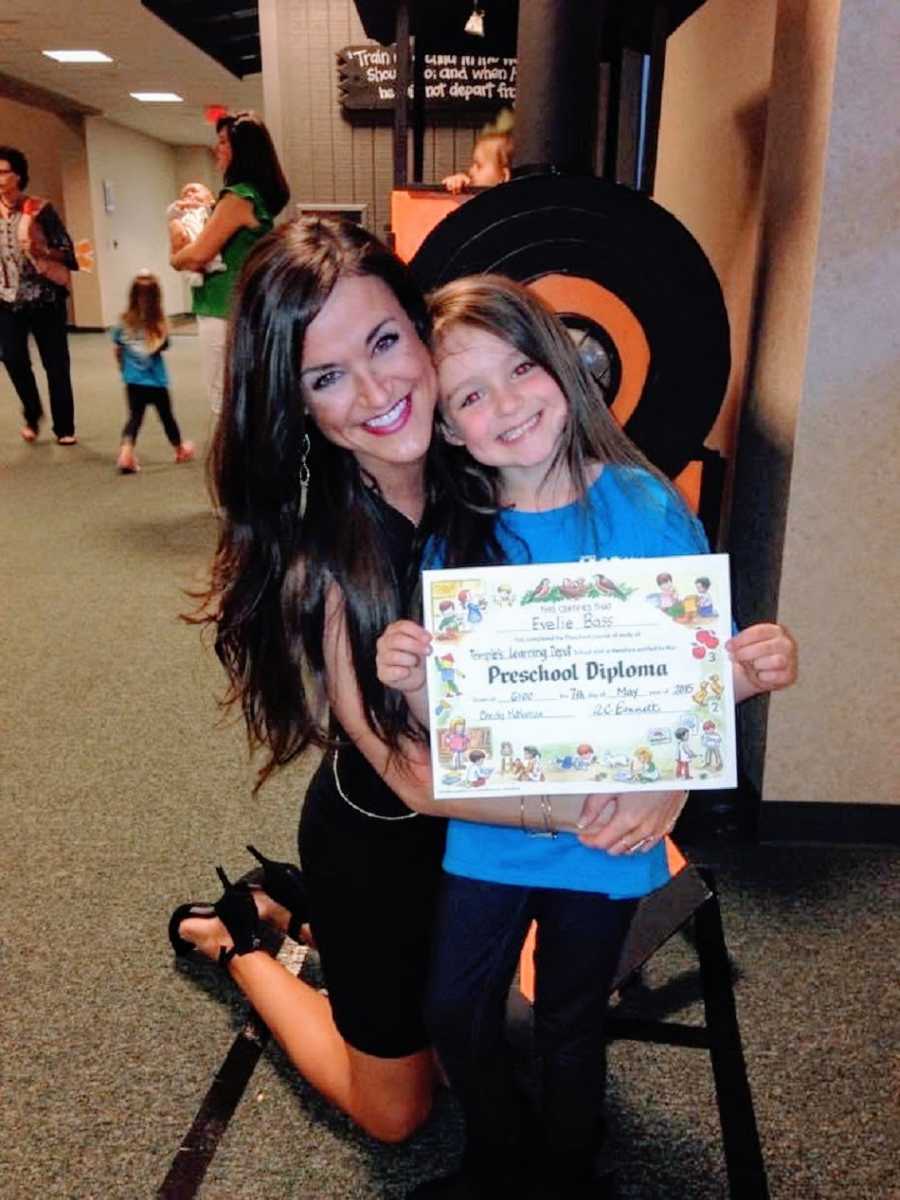 Mom and daughter at preschool graduation