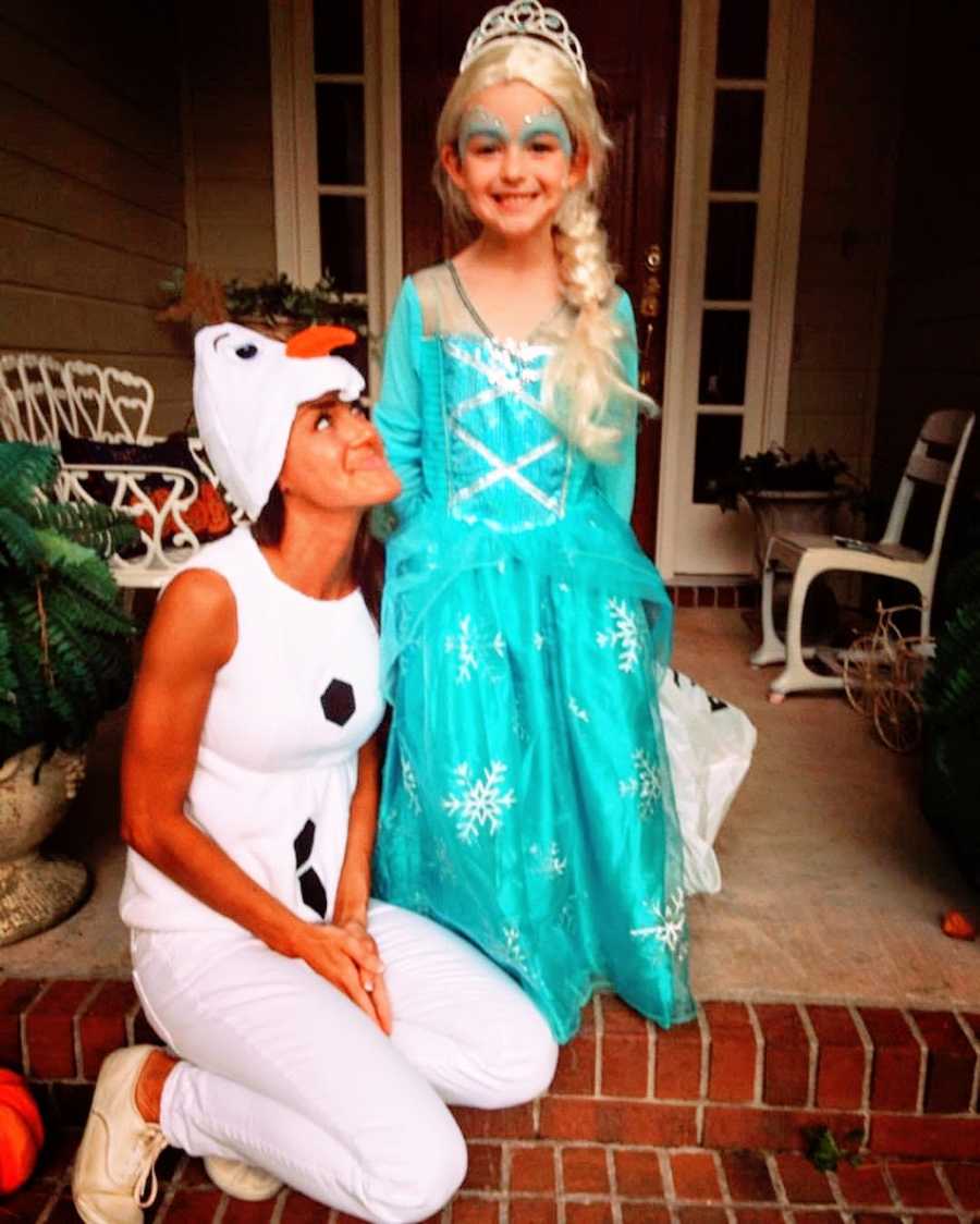 Mom and daughter dressed in Halloween costumes