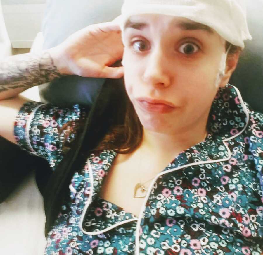 woman with epilepsy taking selfie post surgery