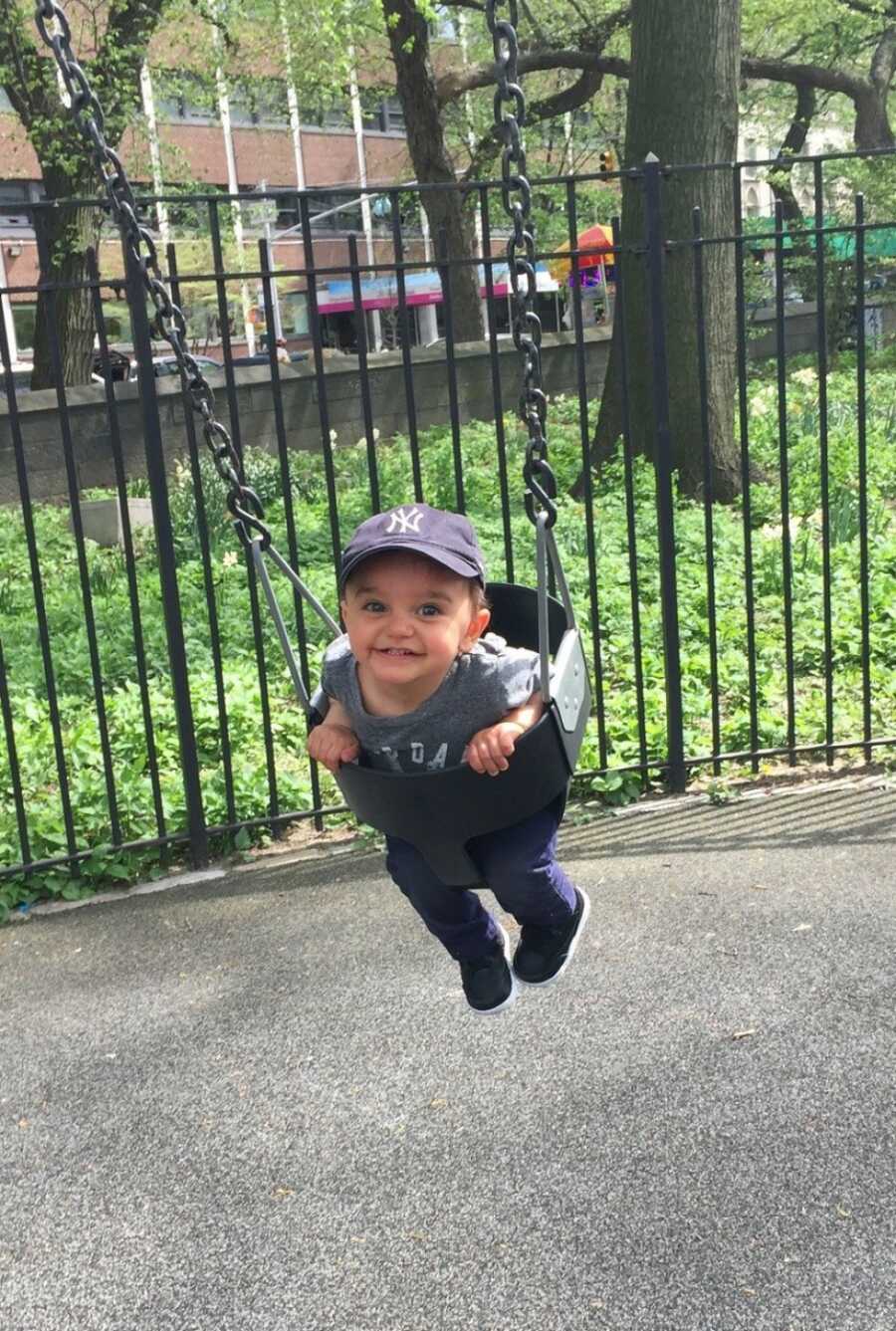 baby in swing