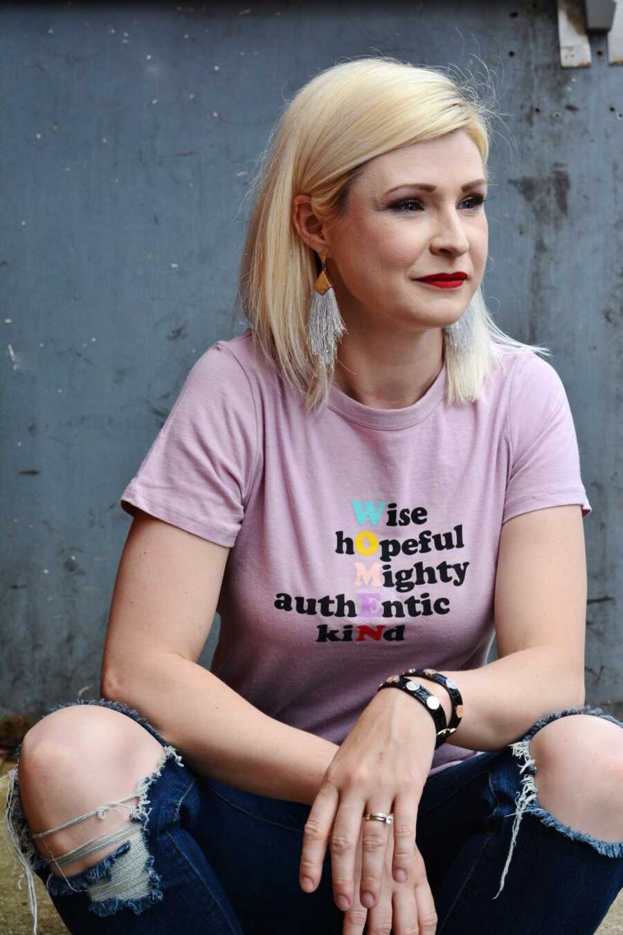 Mom recovering from a maternal mental breakdown wears a shirt that says "WOMAN: Wise, Hopeful, Mighty, Authentic, and Kind"