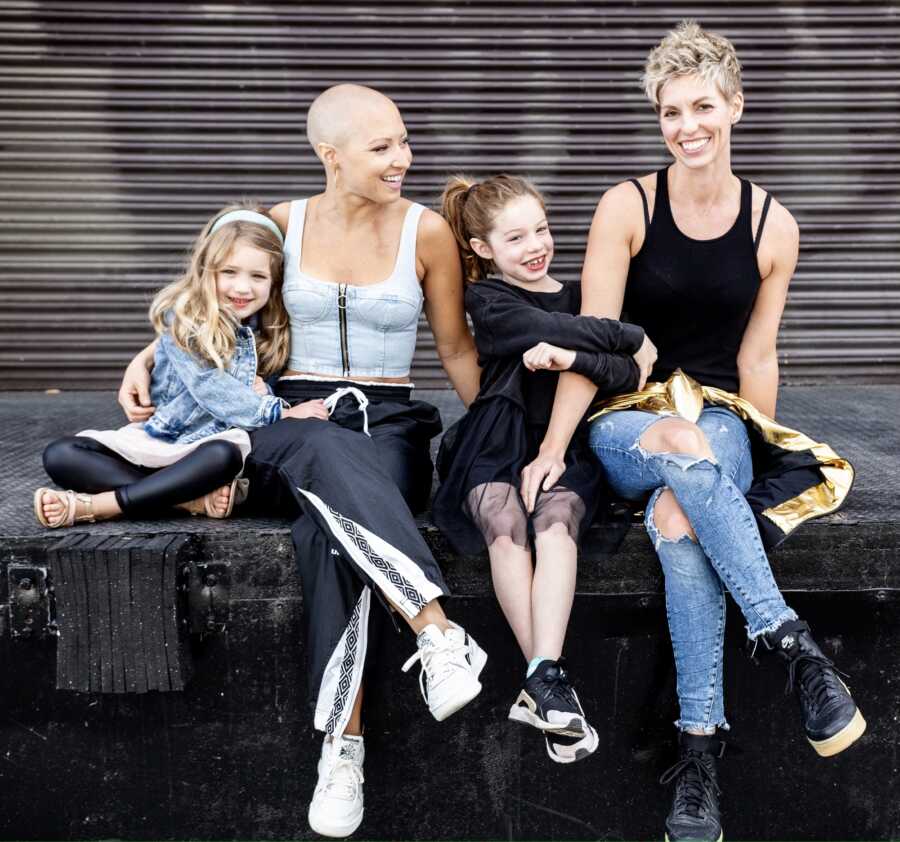 Two moms take family photos with their daughters while one battles breast cancer