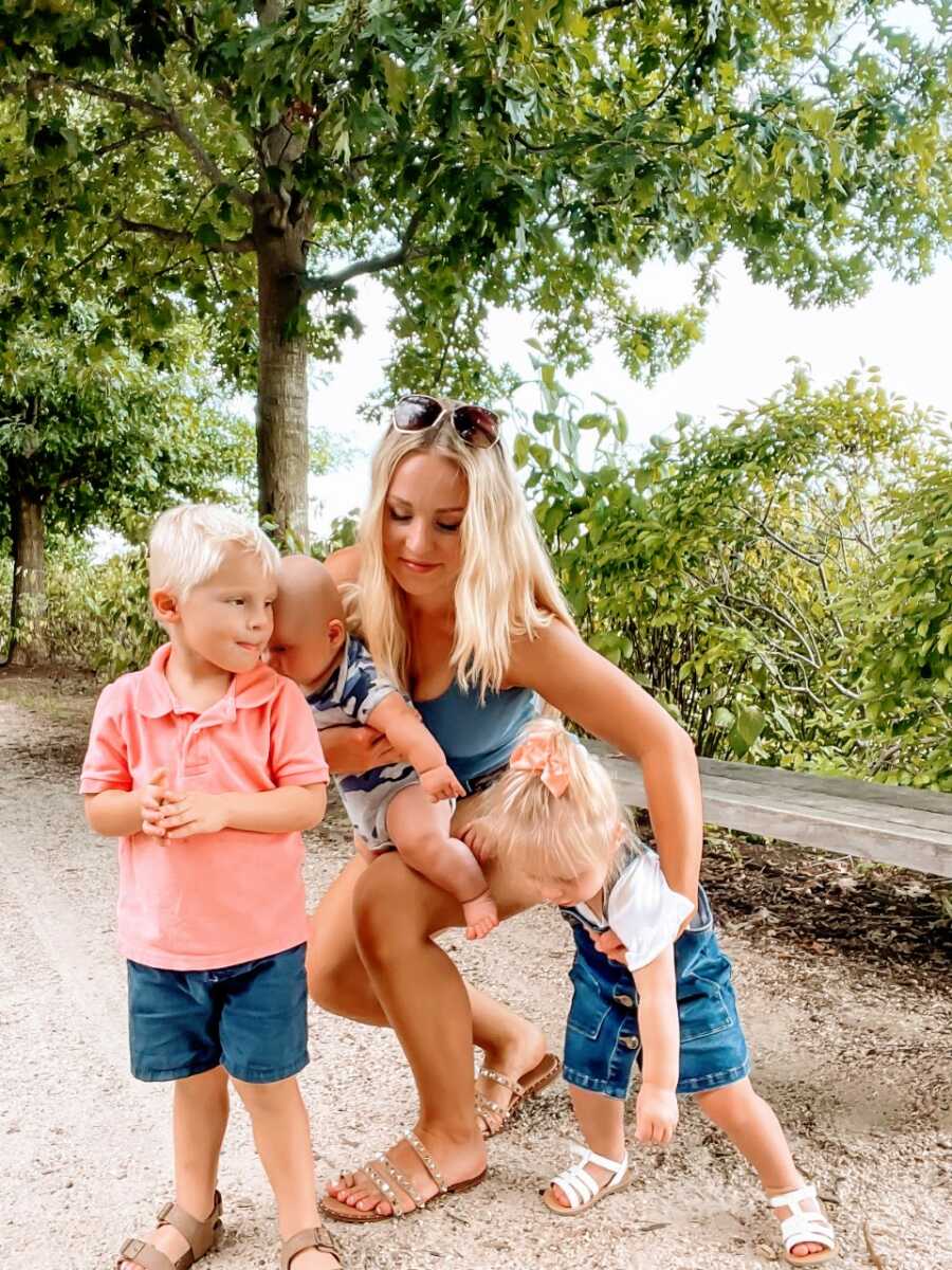 Mom of 3 shows candid photo of what it's like trying to get a good picture with her children while out on a nature walk