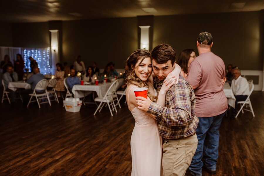 woman and husband having fun together dancing without the thought of a baby