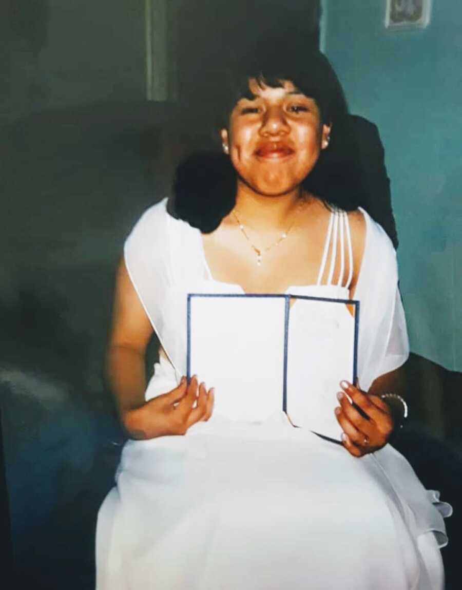 young woman wearing white dress