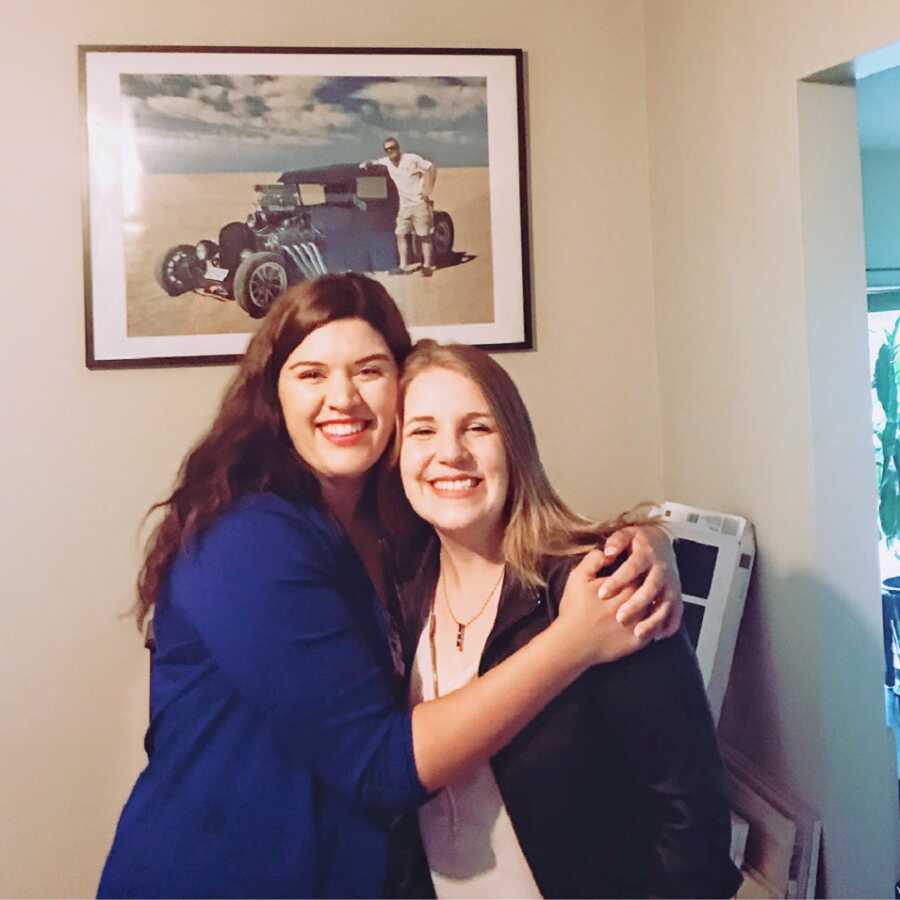 Woman with bipolar hugs friend who supported her