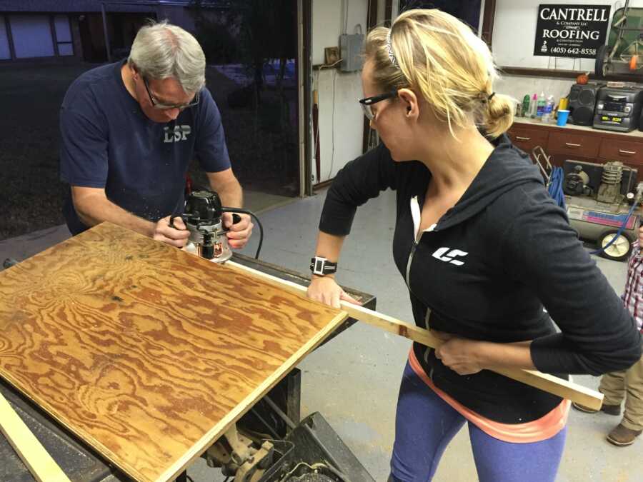 dad and daughter building