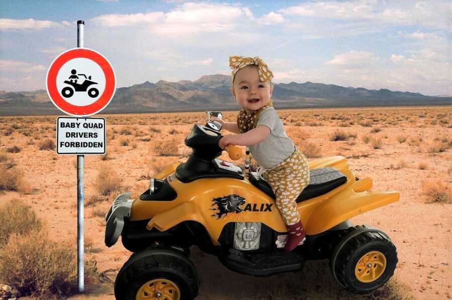 Dad photoshops baby riding a quad in the desert. 