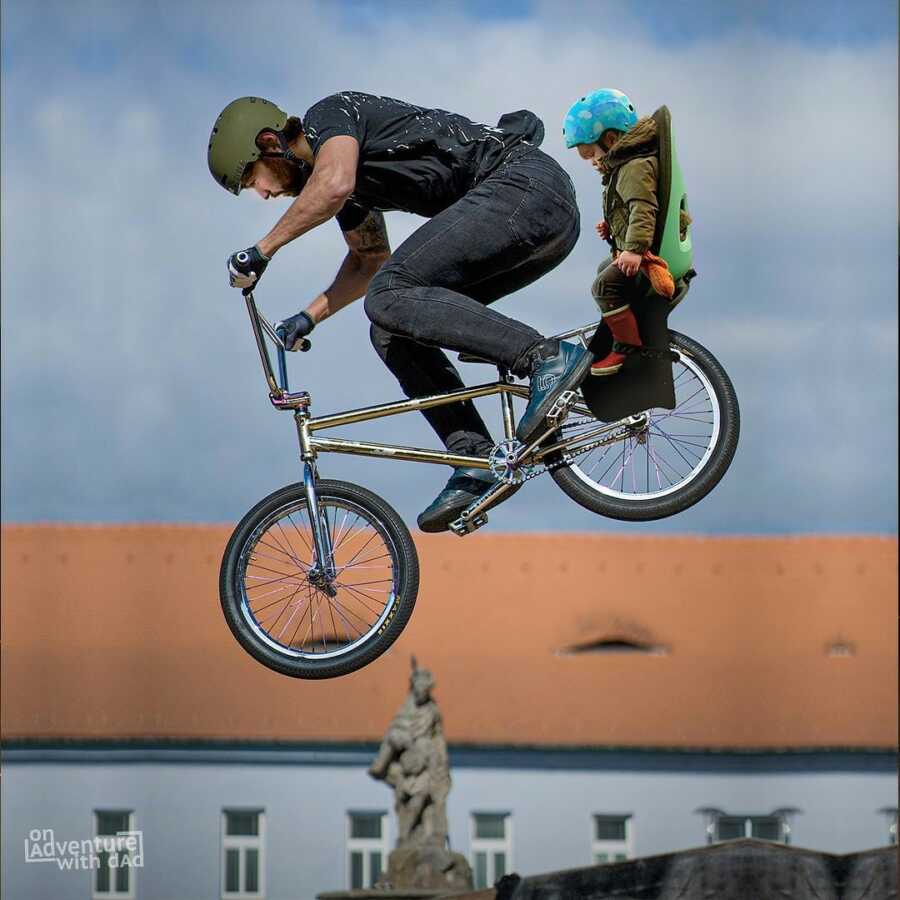 Dad photoshops bicycle jump with baby on board. 