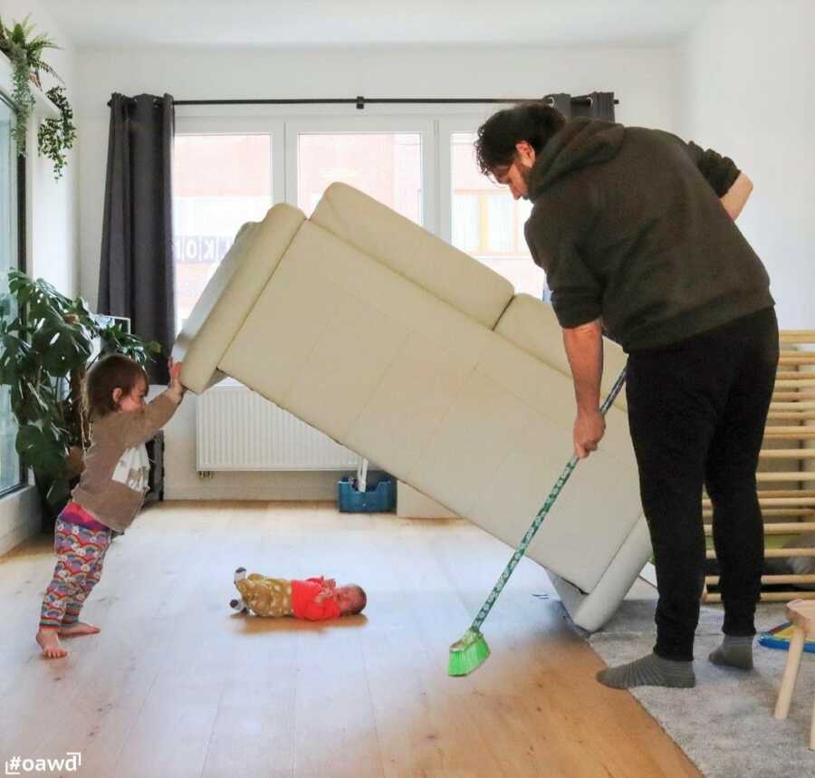 Toddler lifts couch for dad to sweep underneath, but they find the baby instead. 