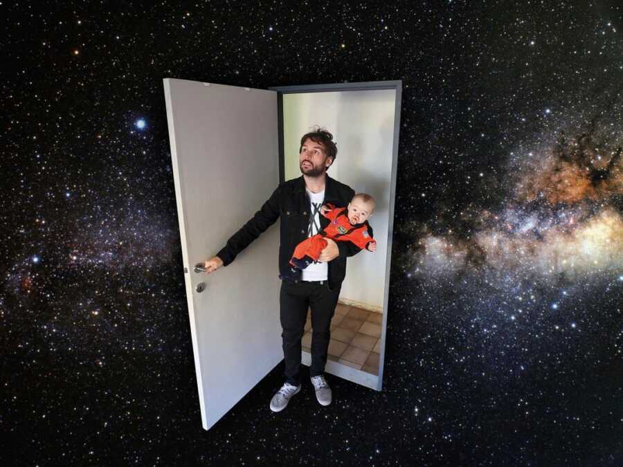 Dad photoshops stepping through a door into the galaxy while holding baby in space suit. 