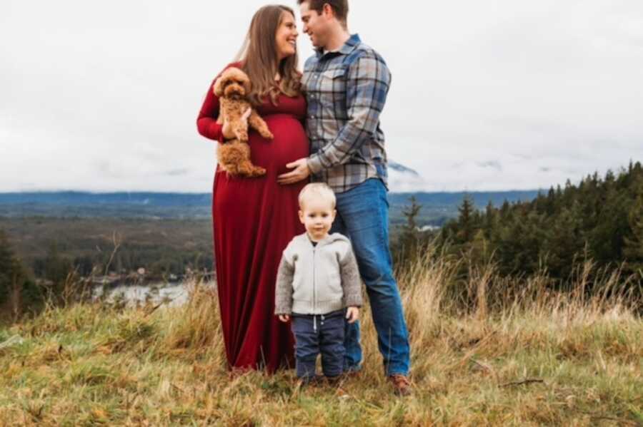 mom and her family together as she is pregnant