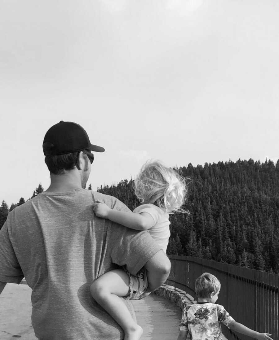 dad holding baby