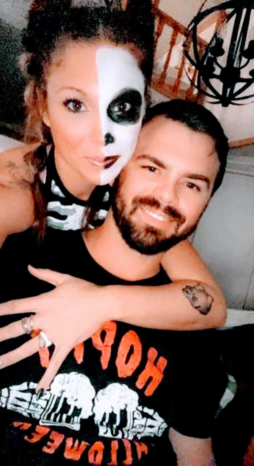 Married couple take an intimate selfie together on Halloween while in Halloween costumes
