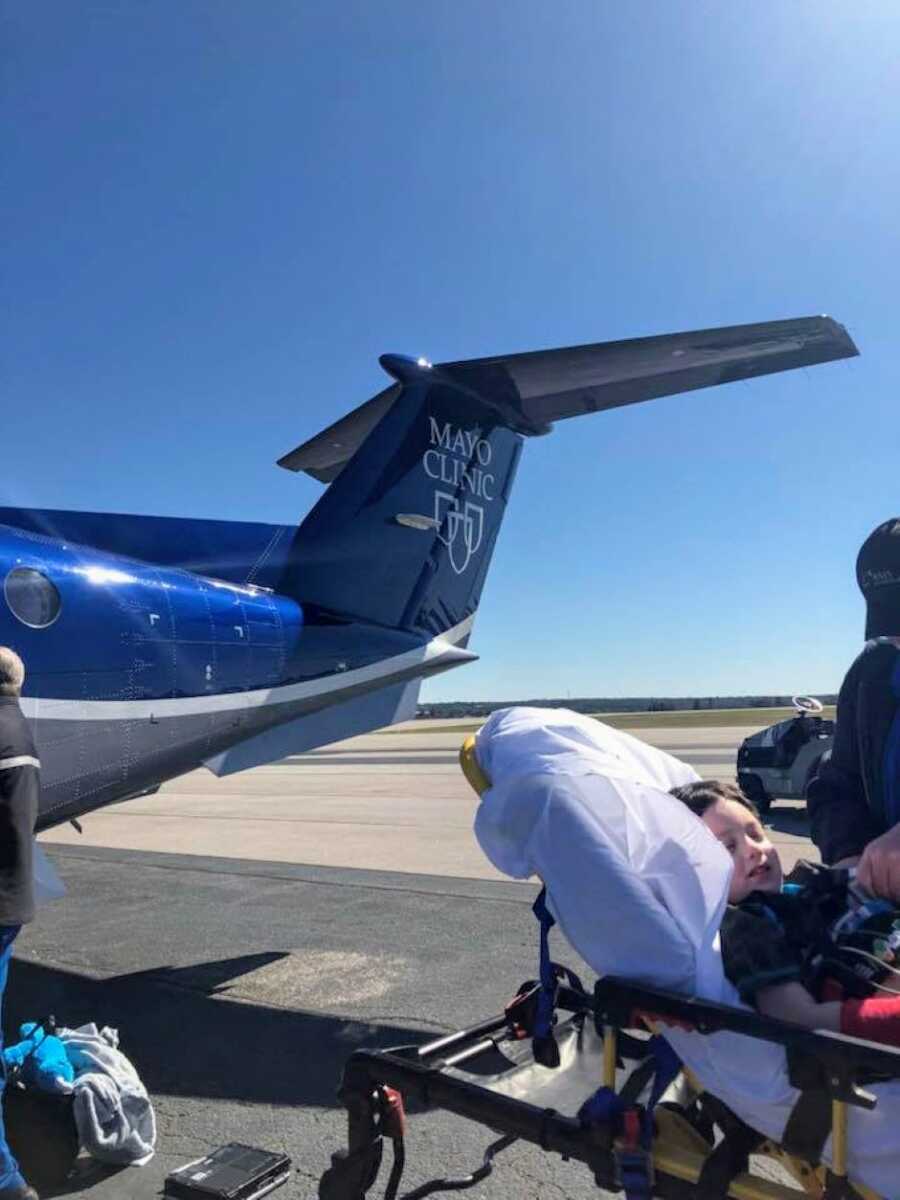 Little boy with severe epilepsy prepares to get on a plane to the Mayo Clinic