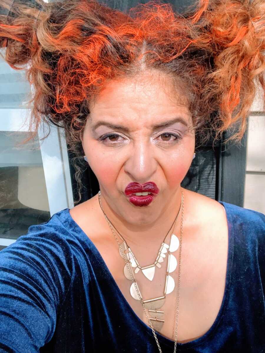 Mom takes a selfie in her DIY Halloween costume of Winifred Sanderson from Hocus Pocus