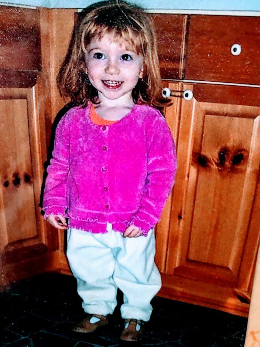 little girl with celiac wearing pink shirt