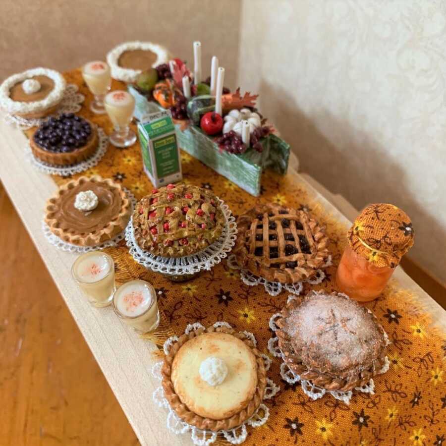 Miniature Thanksgiving pies made from sculpted clay.