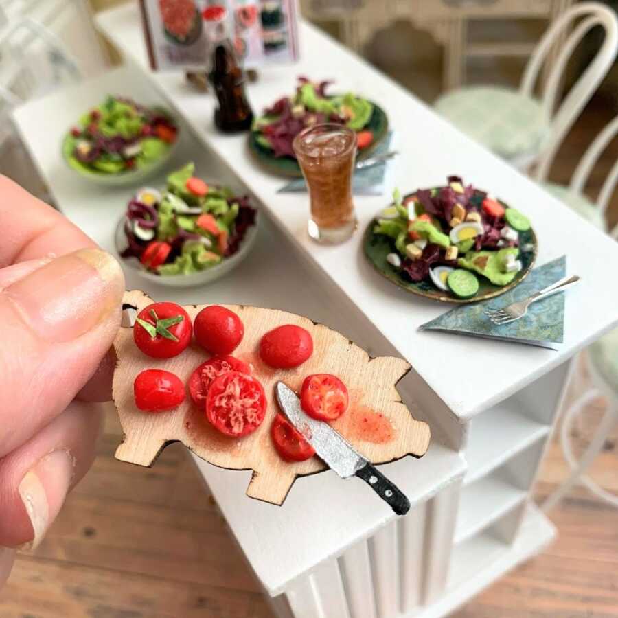 Miniature salads made from sculpted clay.