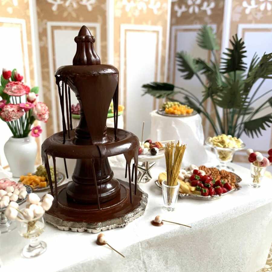 Miniature chocolate fountain clay sculpted dollhouse food.