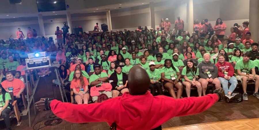 Fletcher Cleaves, motivational speaker, addresses a group of youth. 