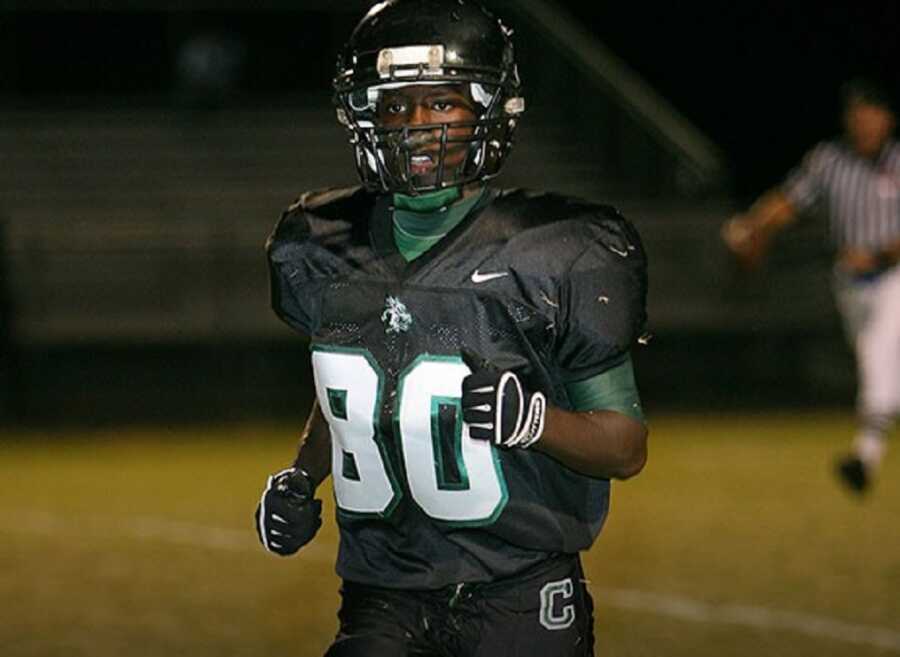 Fletcher Cleaves playing football as a young man. 