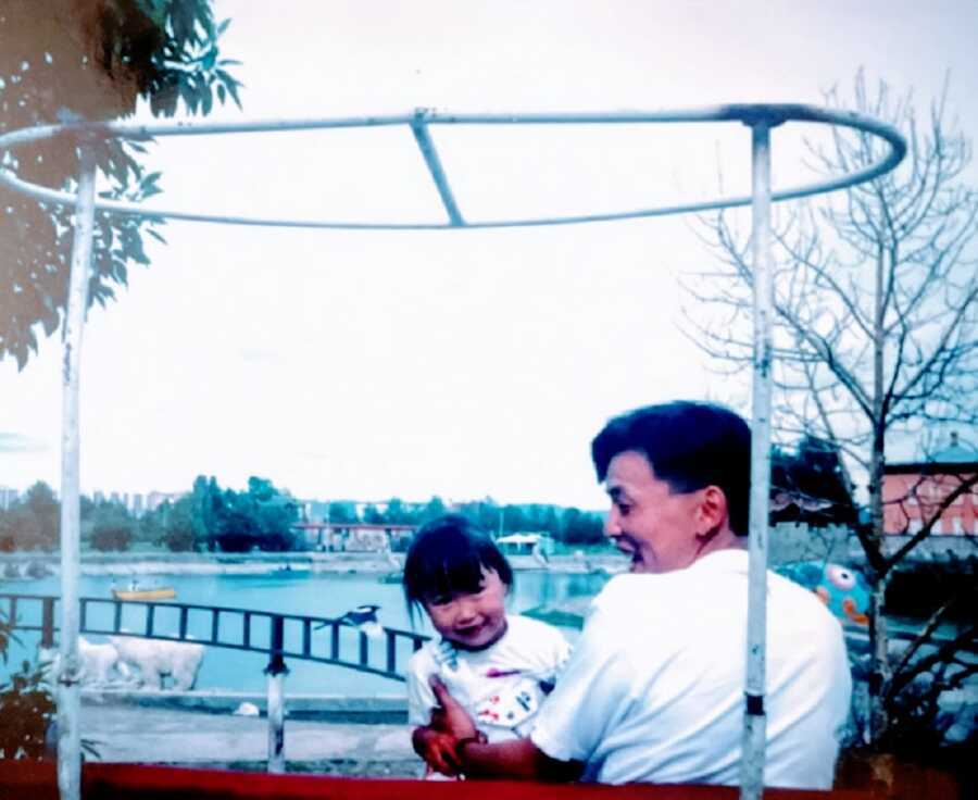 Young girl with cerebral palsy and her father